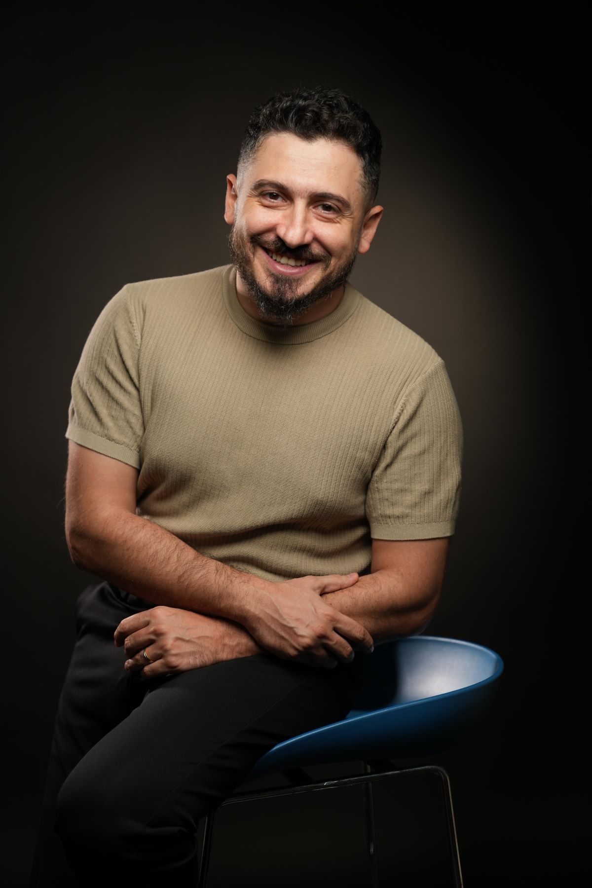 Elie Farhat working on a branding project in a modern office, analyzing market data for digital transformation.